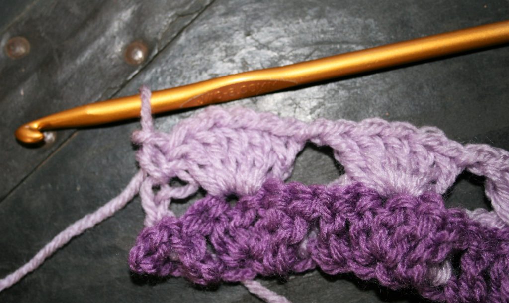 Single crochet in last stitch or turning chain.